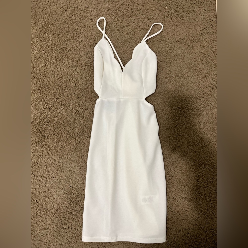 Brand new short white spaghetti cut out strap dress! SIZE:XS